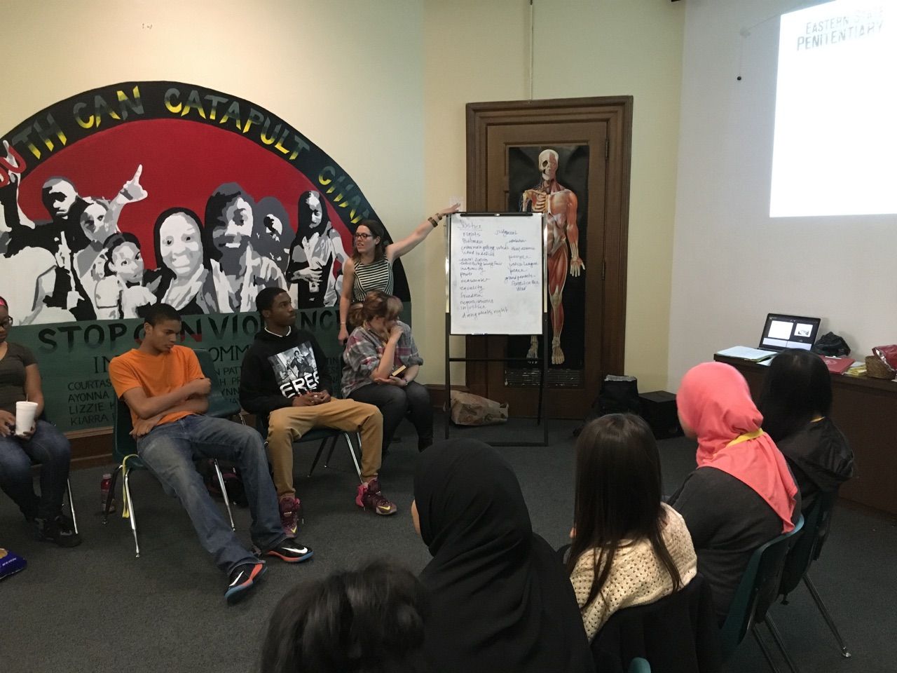 Lauren Zalut, Director of Education at Eastern State Penitentiary, works with the Karabots Junior Fellows to find a definition of &quot;justice&quot;