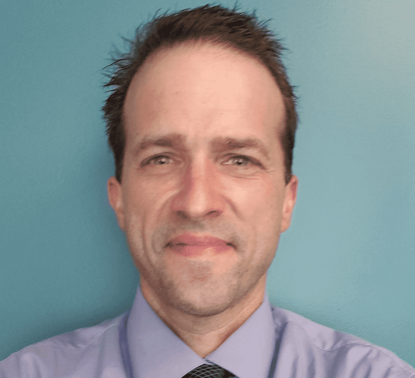 Headshot of Dan van der Kwast