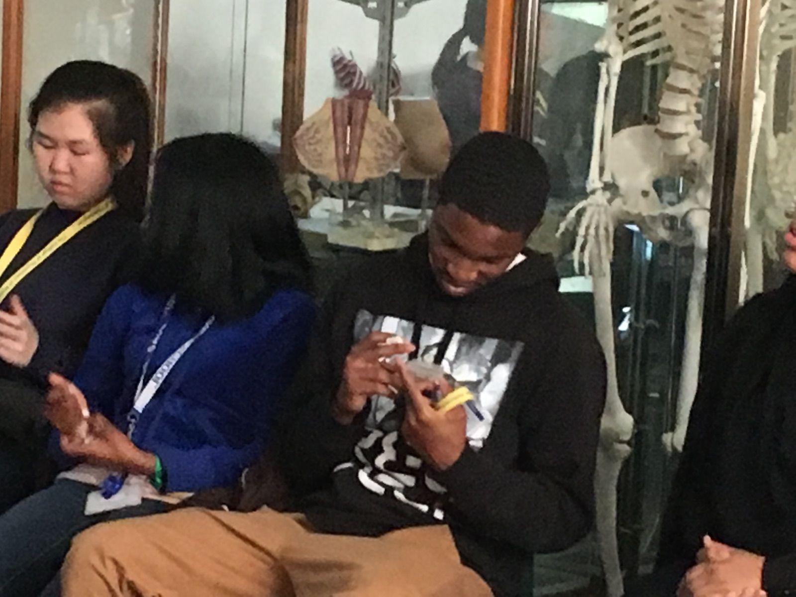 A Karabots Junior Fellow examines some phlebotomy equipment 