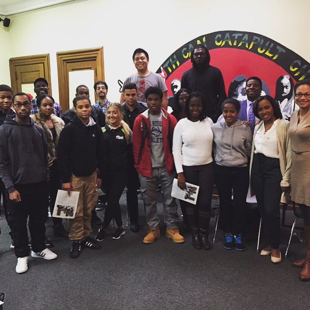Students in the Teva Program pose with Thierry and Florence Momplaisir