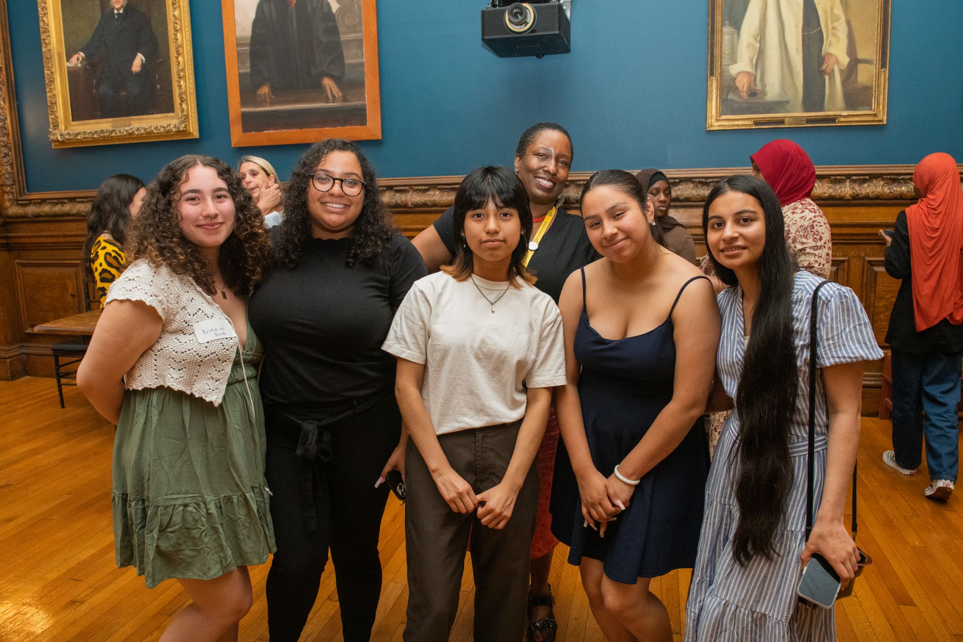 Five high school students pose for a photograph.